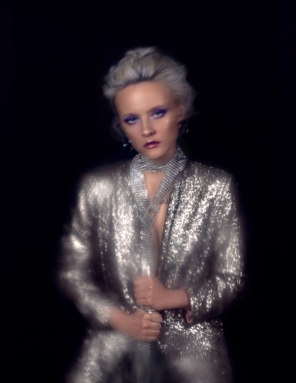 Blurred shining shoot with party blazer