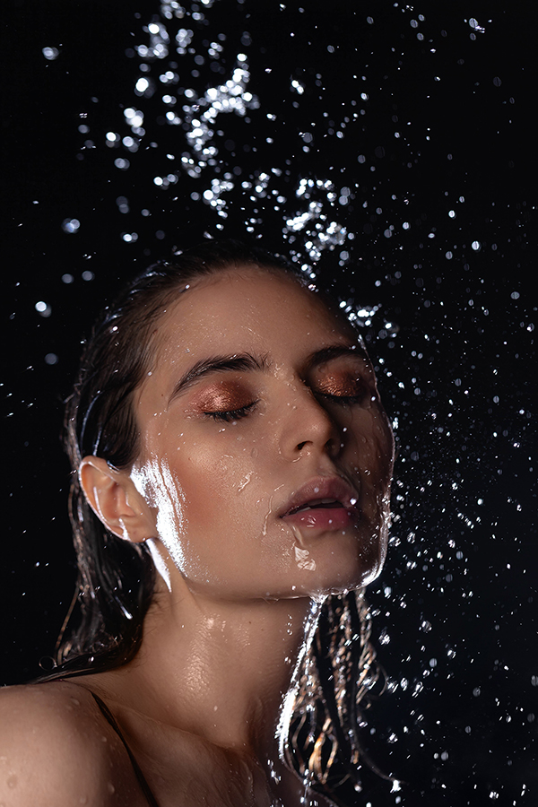 Underwater girl's portrait, water with a short exposure